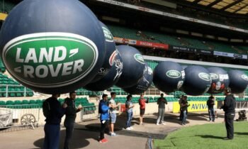 Large inflatable advertising display attracting attention at outdoor event